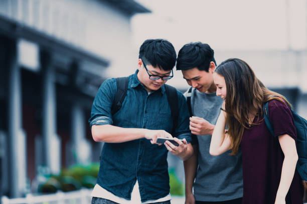Students using digital learning tools and online platforms to explore personalized education pathways through technology.
